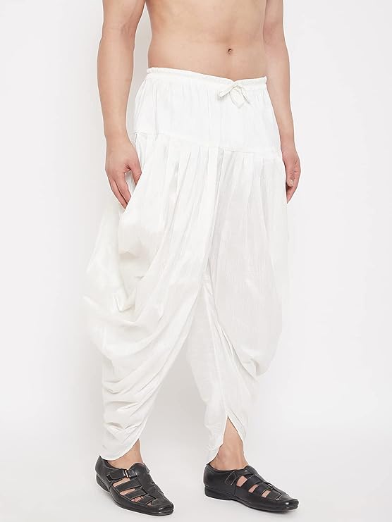 The fabric is soft and durable, and offers a perfect blend of comfort and practicality. Its unique design and cowl pattern make this dhoti a timeless piece.