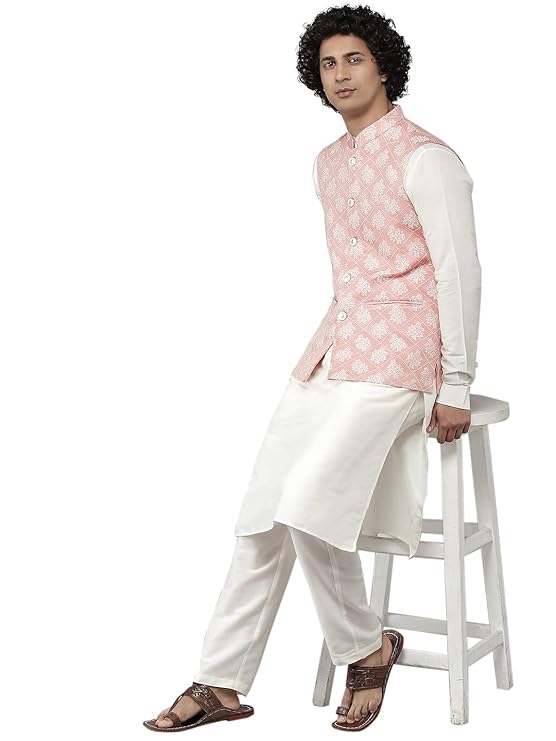 jacket offers a timeless look. The subtle coral and white details add an elegant touch to any look. fashion icon with a designs Men Coral& White Woven Jacquard Nehru Jacket.