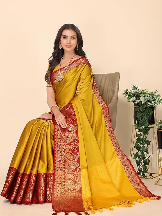 This jacquard-cotton silk blend saree is crafted with a traditional zari border and a delicate plain weave. It comes with a running blouse piece,