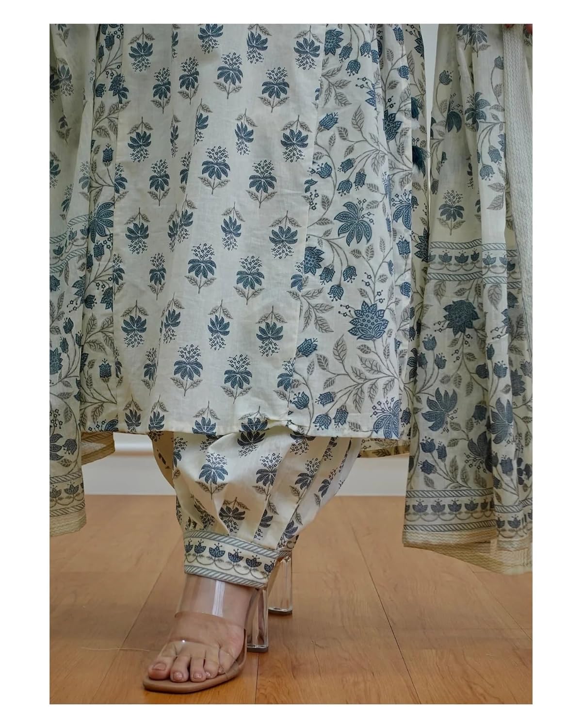 This hand-block printed kurta and palazzo pant set is a beautiful addition to any wardrobe.Anarkali Kurta Palazoo With Dupatta