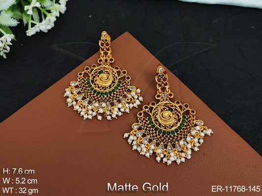 Add a touch of elegance to any outfit with our Antique Jewellery Matte Gold Polish Designer Wear Fancy Wear Earrings Set.