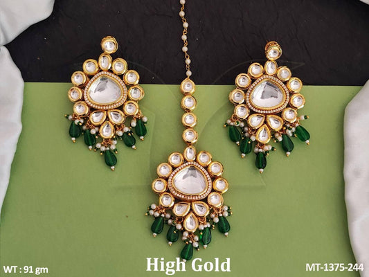 Elevate your ensemble with our Clustered Pearl High Gold Polish Maang Tikka and Earring set.
