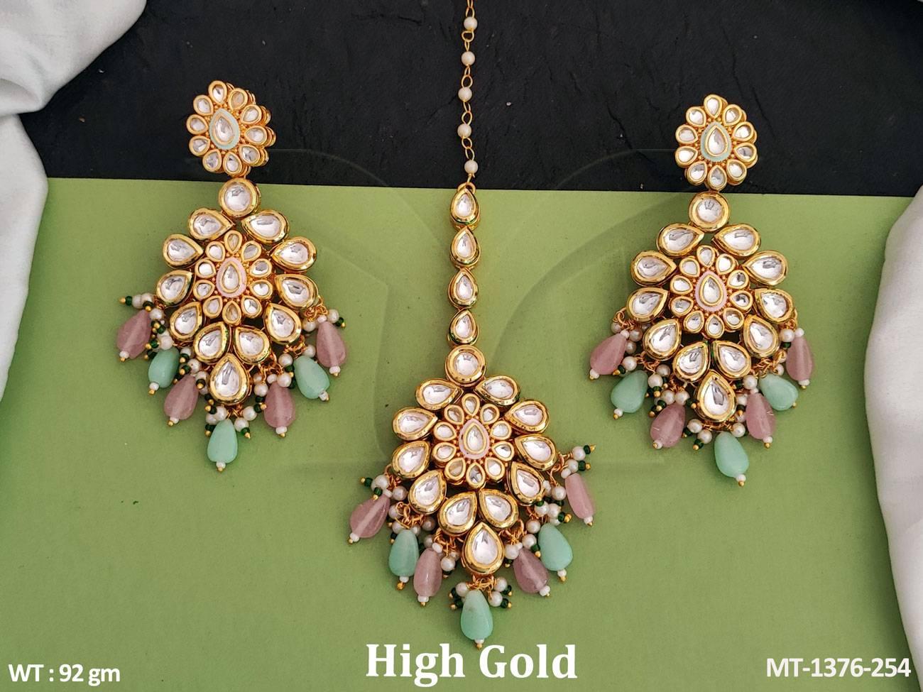 This beautiful kundan maang tikka and earring set is made of high-quality brass metal and features a high gold polish that adds a touch of elegance.