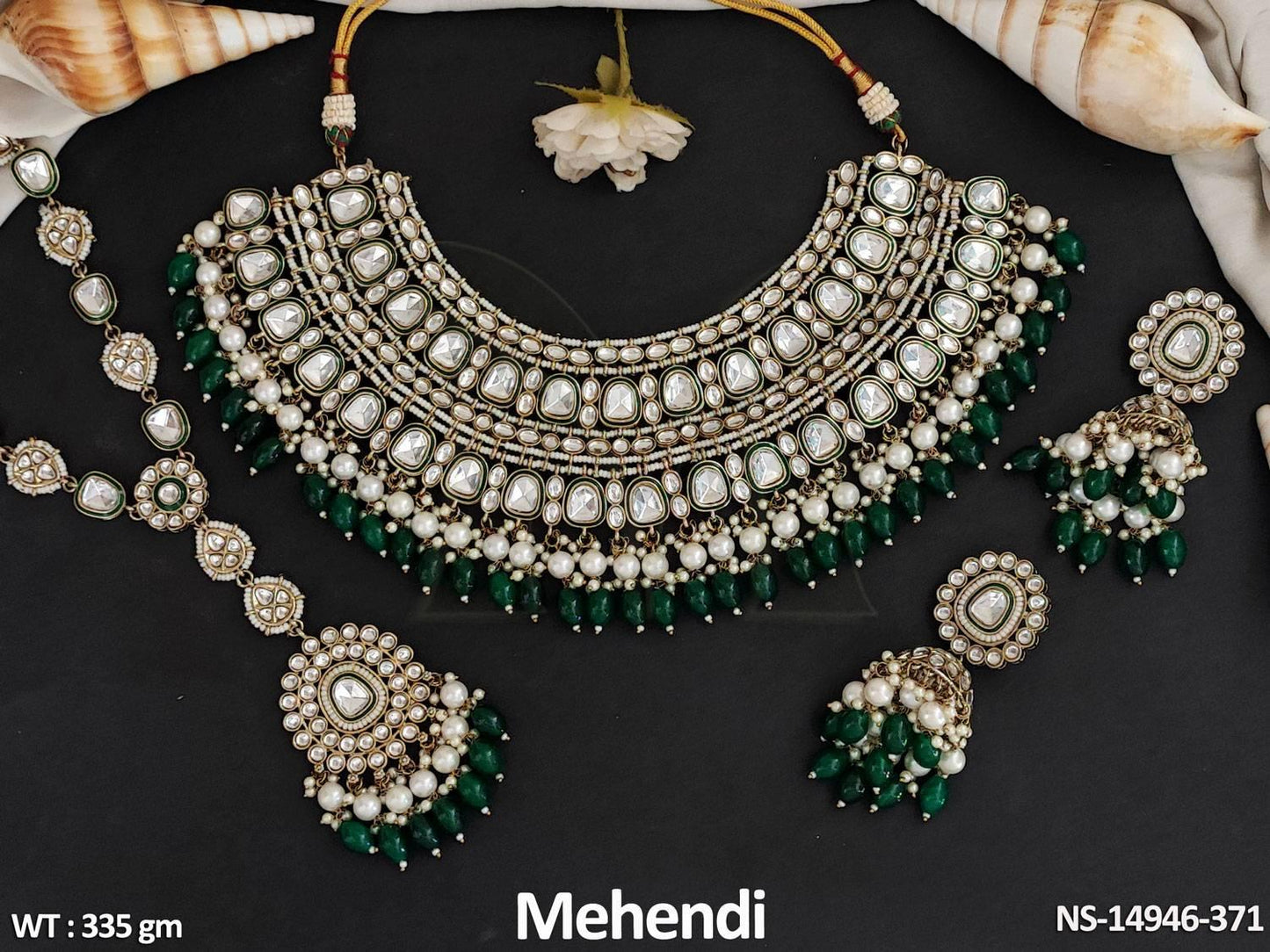 Experience elegance and sophistication with our Kundan Jewellery Stylish Mehendi Polish Heavy Designer Kundan Necklace Set.