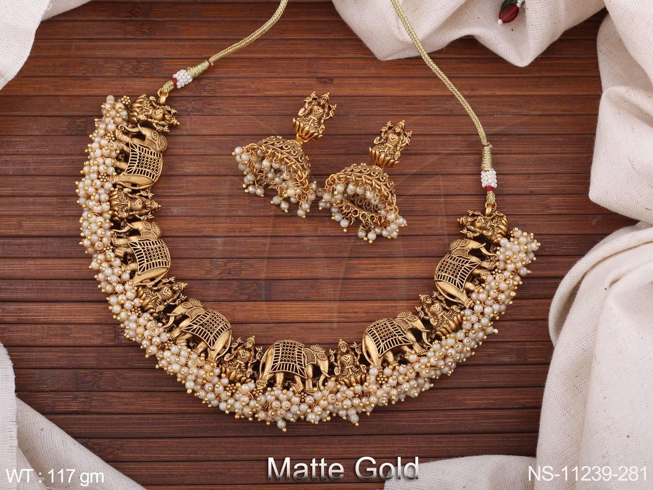 The clustered pearl detailing and fancy style creates a stunningly beautiful look. Show your sophistication and style with this timeless temple jewellery.