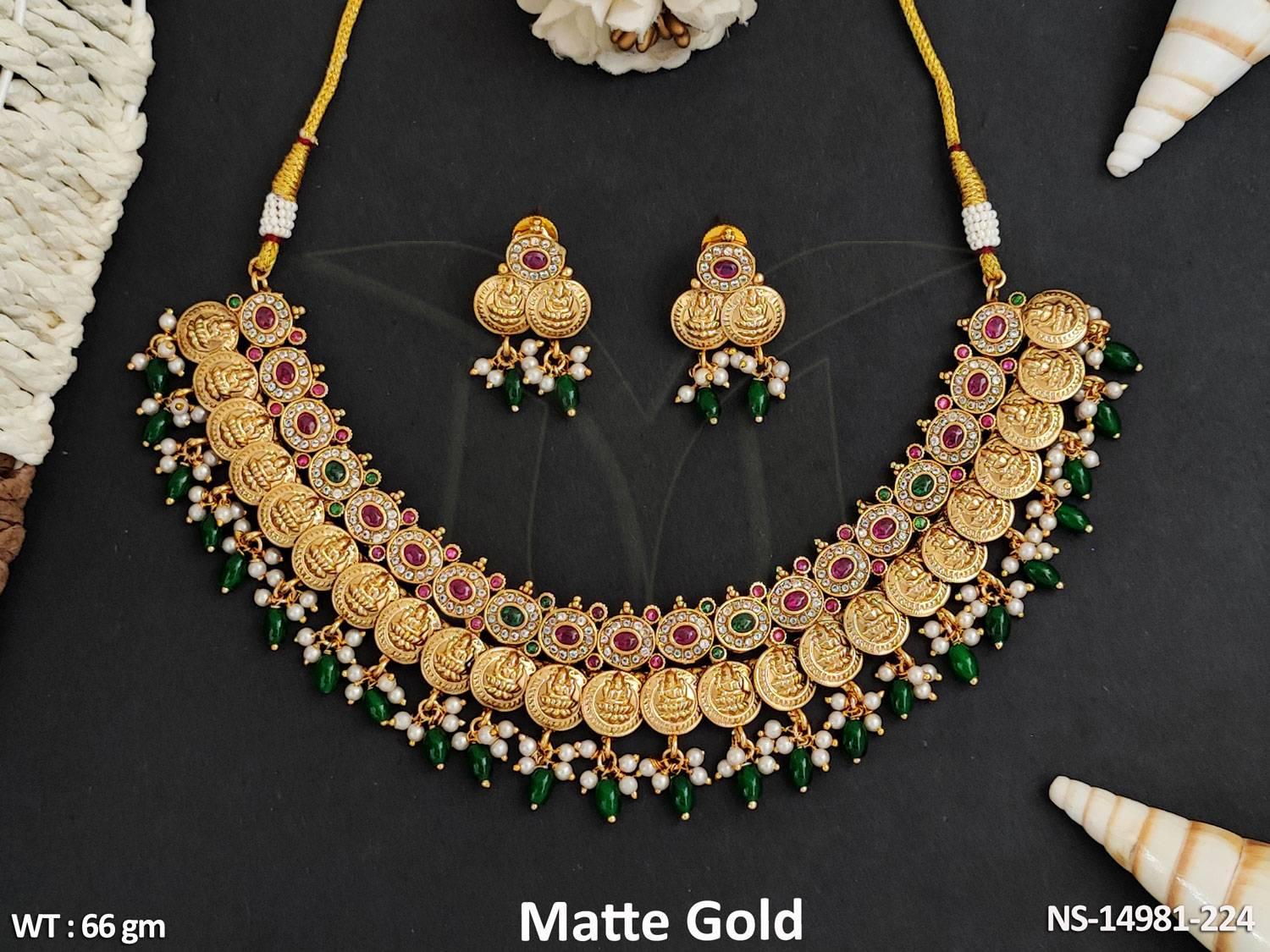 This stunning Temple Jewellery necklace set features a beautiful design with impeccable matte gold polish