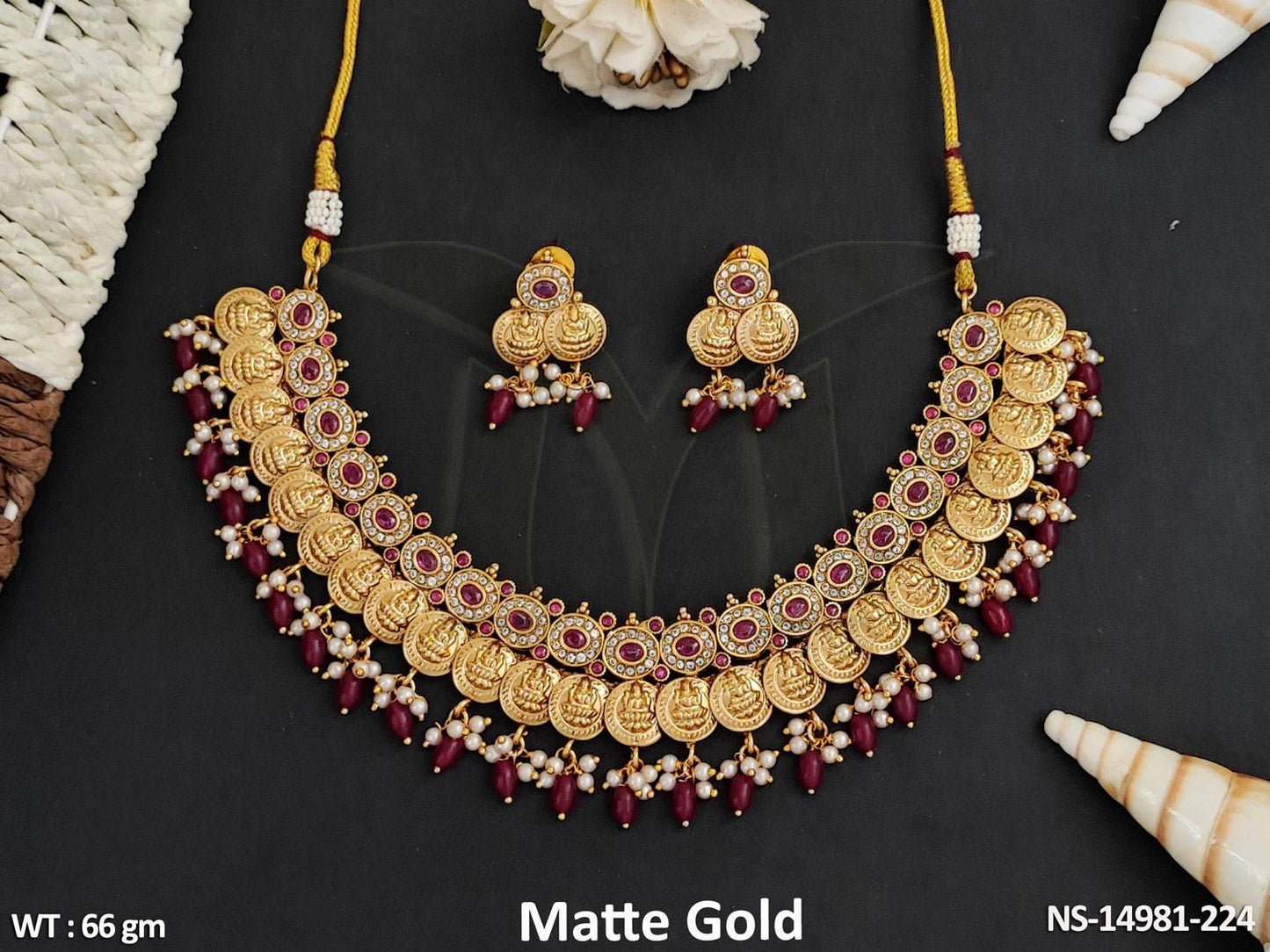 This stunning Temple Jewellery necklace set features a beautiful design with impeccable matte gold polish