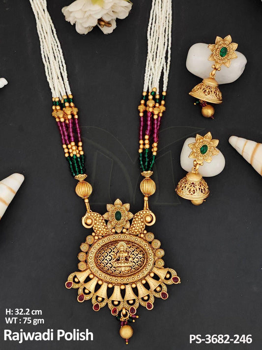 This Temple Jewellery Rajwadi Polish pendant set showcases a fancy design with a God figure, making it a unique and beautiful accessory.