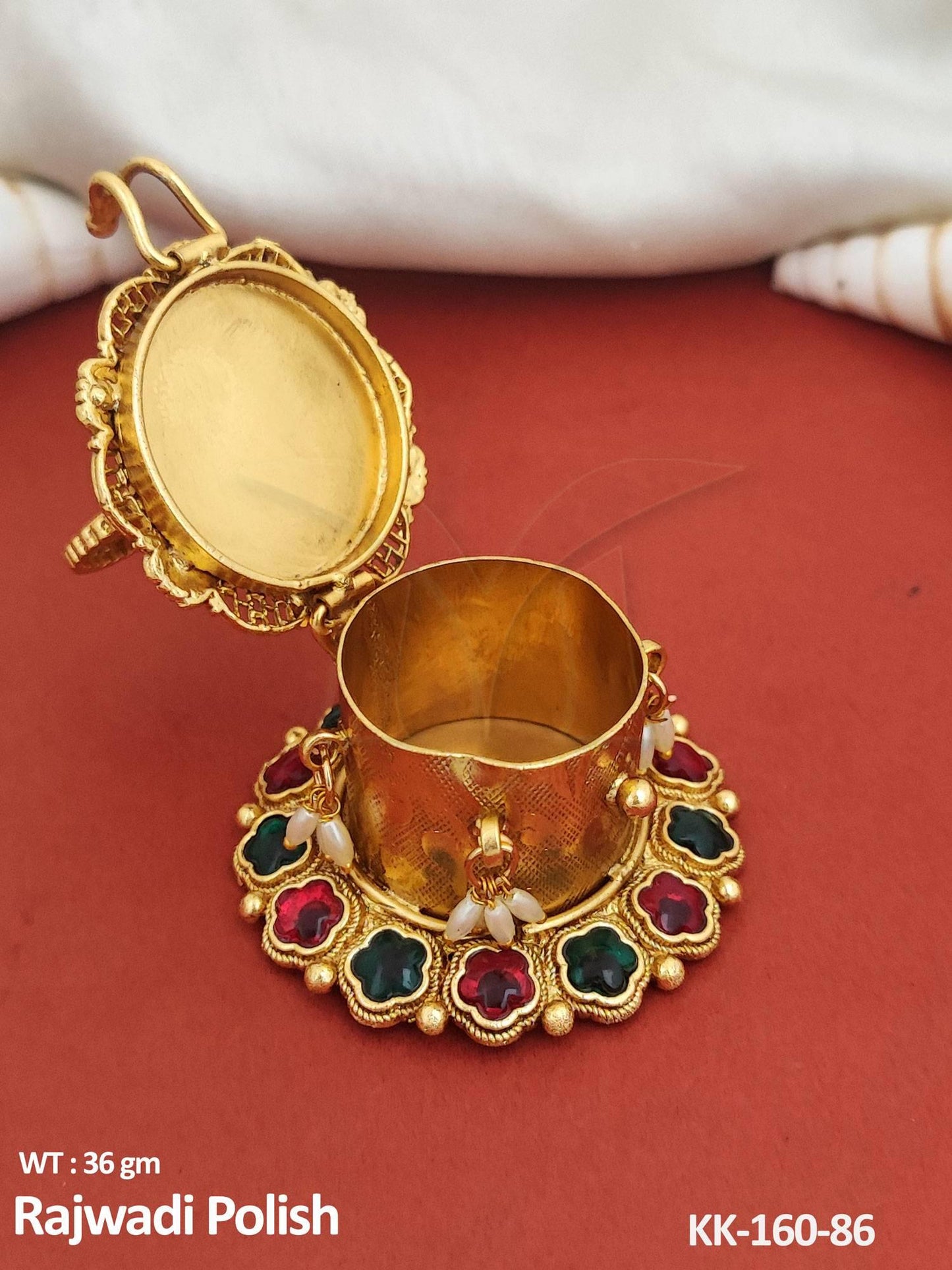 Indulge in the exquisite beauty of our Temple Jewellery Fancy Design Rajwadi Polish Sindoor Box
