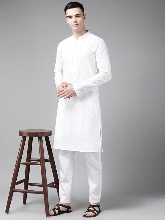 This classic men's Kurta from Designs is crafted from pure cotton and features beautiful chikankari embroidery.