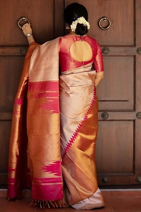 stunning combination of Banarasi Soft Lichi Silk and Kanjivaram Silk.t comes with a soft Lichi Silk blouse piece for a traditional, elegant look.
