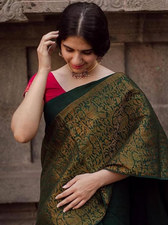 exquisite woven design Kanjivaram Banarasi saree is skillfully crafted from finest silk with a beautiful finish and texture.