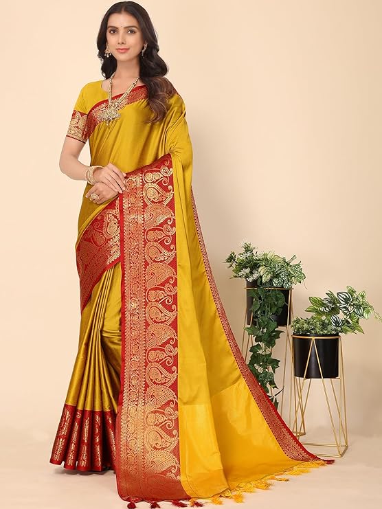 This jacquard-cotton silk blend saree is crafted with a traditional zari border and a delicate plain weave. It comes with a running blouse piece,
