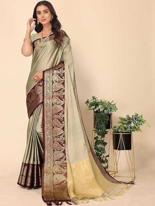 saree is an exquisite blend of Jacquard Cotton and Silk, with a plain solid design and golden zari border.