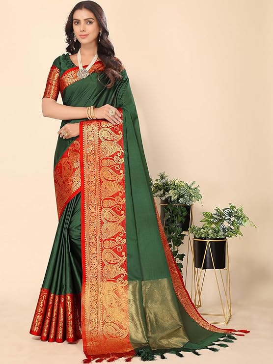 Experience a luxurious blend of jacquard cotton and silk with this Indian Banarasi saree. Woven with a solid design, golden zari border and running blouse piece,