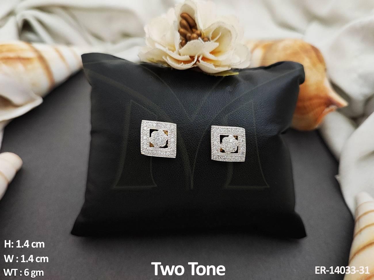 These unique Square Shape Flower Design Two Tone Polish AD Tops Studs Earrings add a touch of elegance to any outfit.