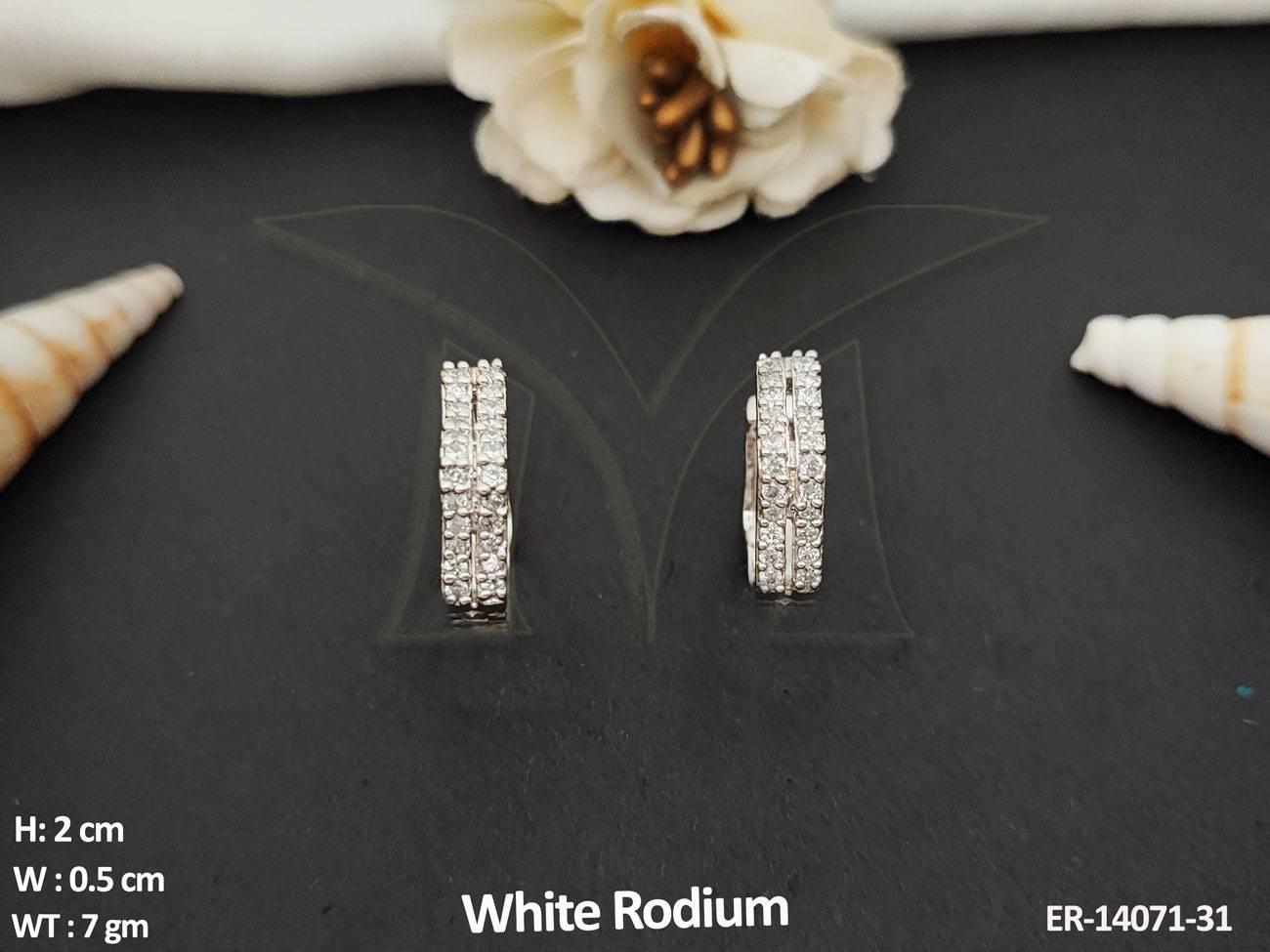 Introducing Full Stone Designer Wear White Rodium Polish Ad Tops Studs Earrings. These elegant earrings feature a stunning polished finish and are perfect for any occasion.