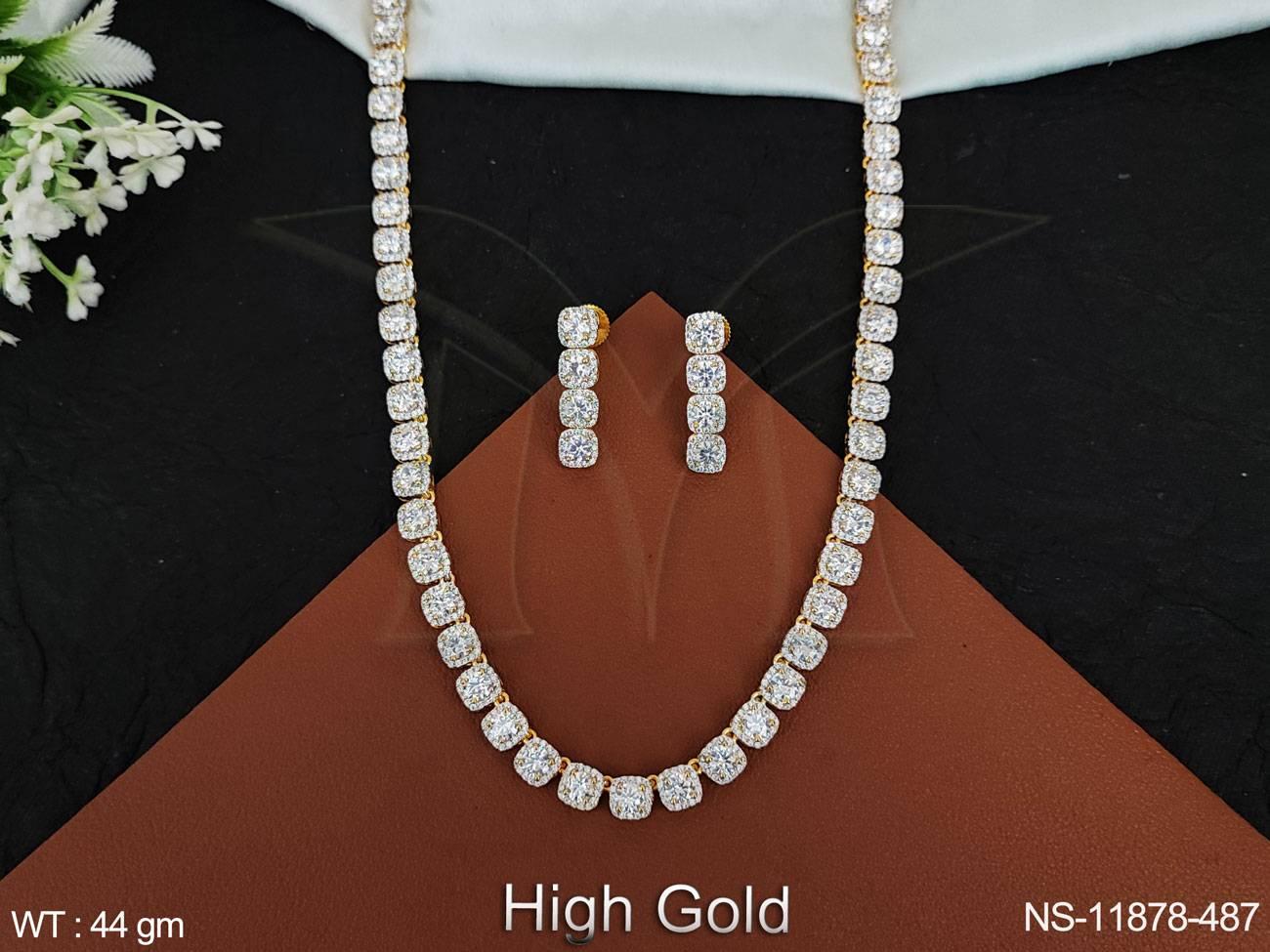 This Designer Fancy Style Party wear High Gold Polish Cz Ad Full Stones American Diamond Necklace Set adds a touch of elegance to any outfit.