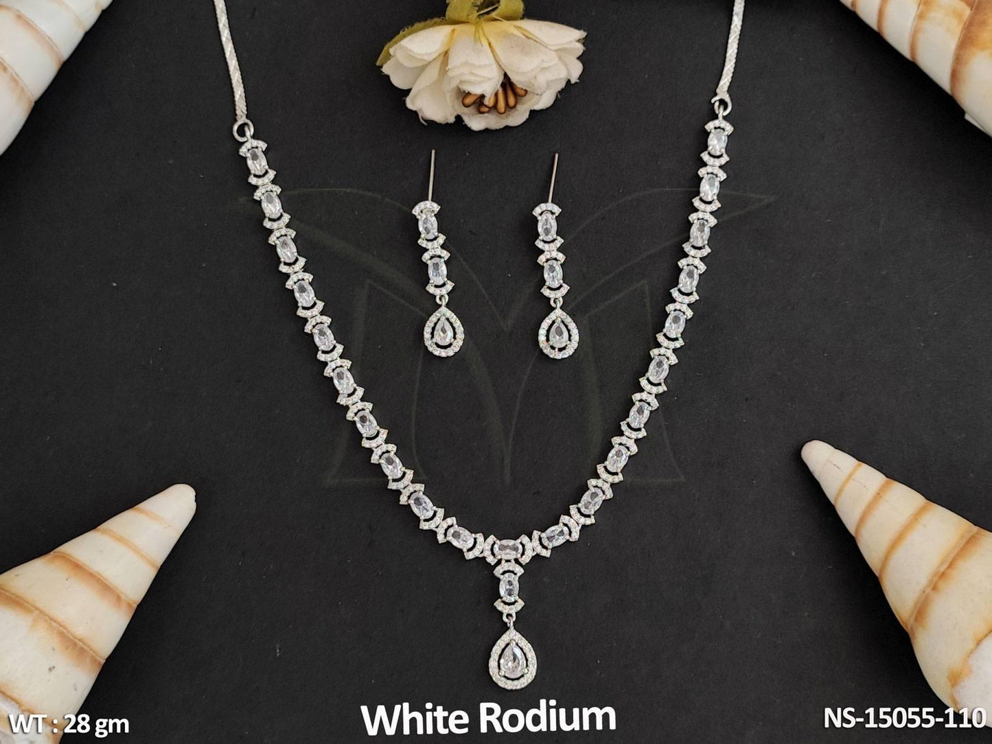 Elevate your party look with this stunning Beautiful Designer AD Necklace Set.