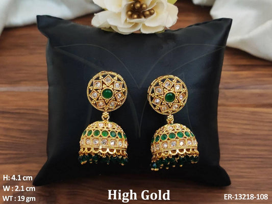 Expertly crafted from brass metal, these Fancy Designer Jhumka Earrings feature a luxurious High Gold Polish for a sophisticated look.