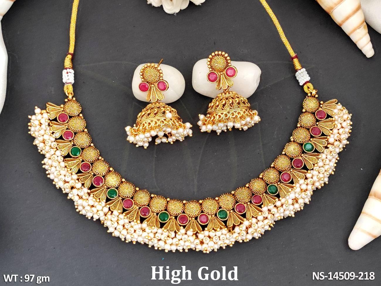 This Antique Jewellery High Gold Polish Clustered Pearl Fancy Style Necklace Set boasts a stunning design with high gold polish and clustered pearls.