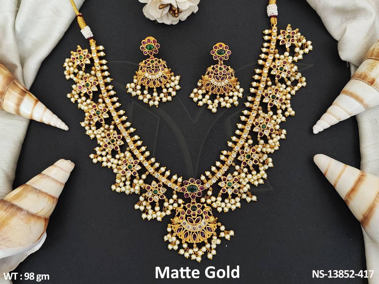 Beautiful necklace set is crafted with a matte gold polish finish and is adorned with a fancy cluster pearl design.
