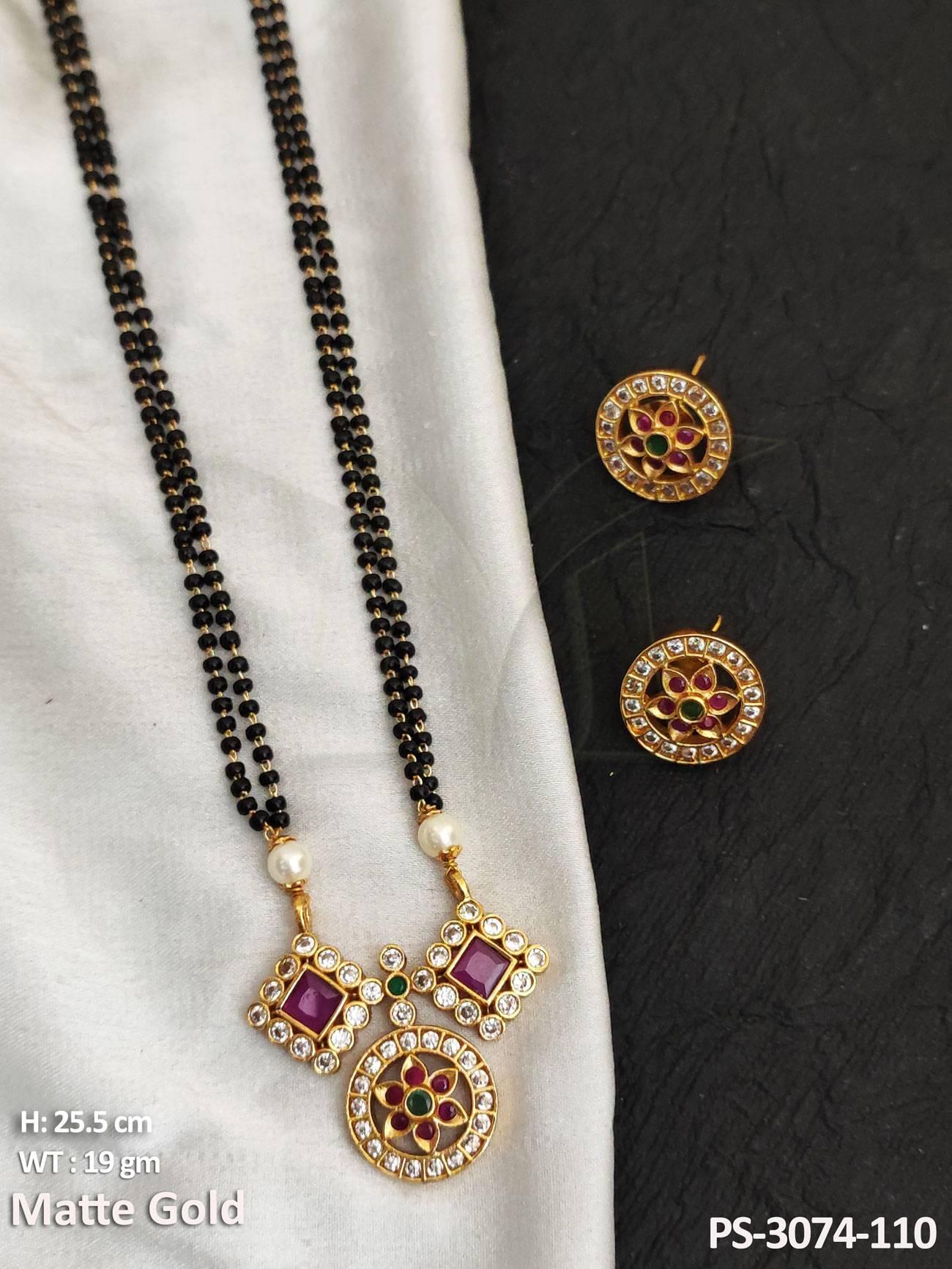 This stunning pendant set is crafted using matte gold polish with a fancy design. Perfect for special occasions, this set is sure to make you shine.