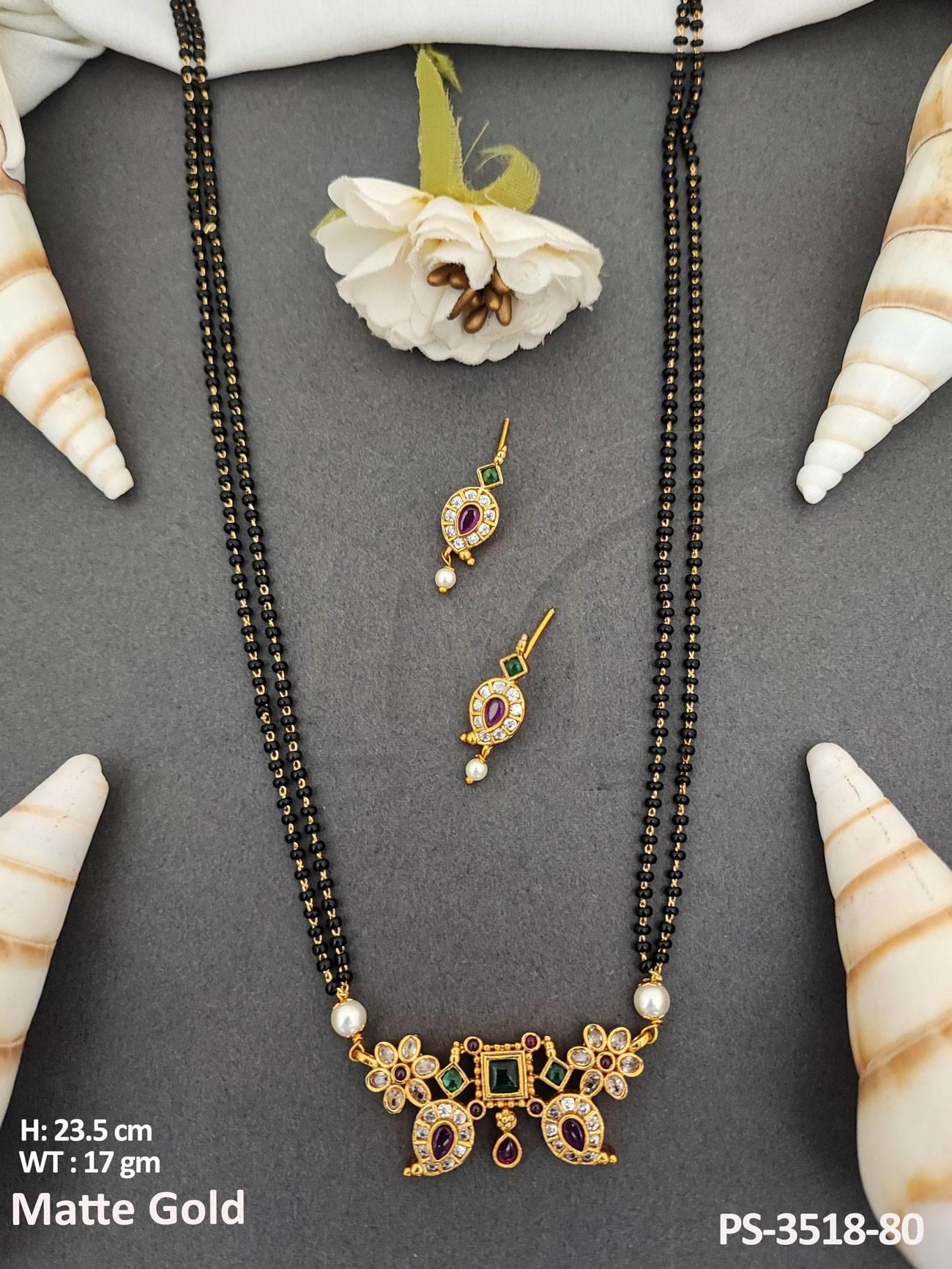 Exclusive Pendant Set features a designer design with elegant gold matte polish and intricate kemp jewellery detailing.