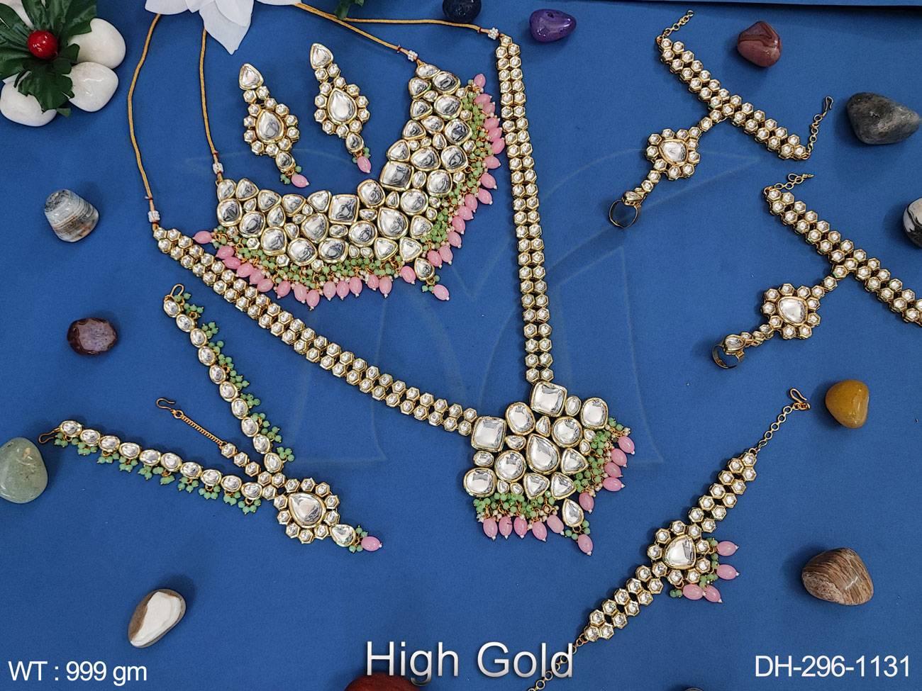 Transform into a breathtaking bride with our Clustered Pearl Kundan Dulhan Set