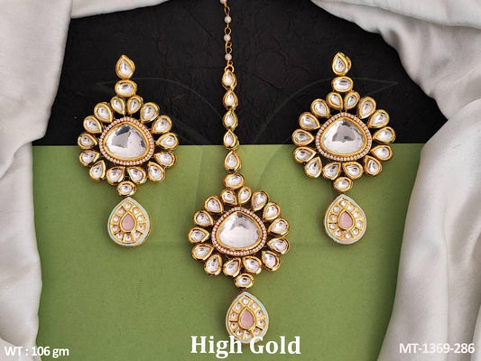 Elevate your party look with our Kundan Stones Maang Tikka and Earring set.