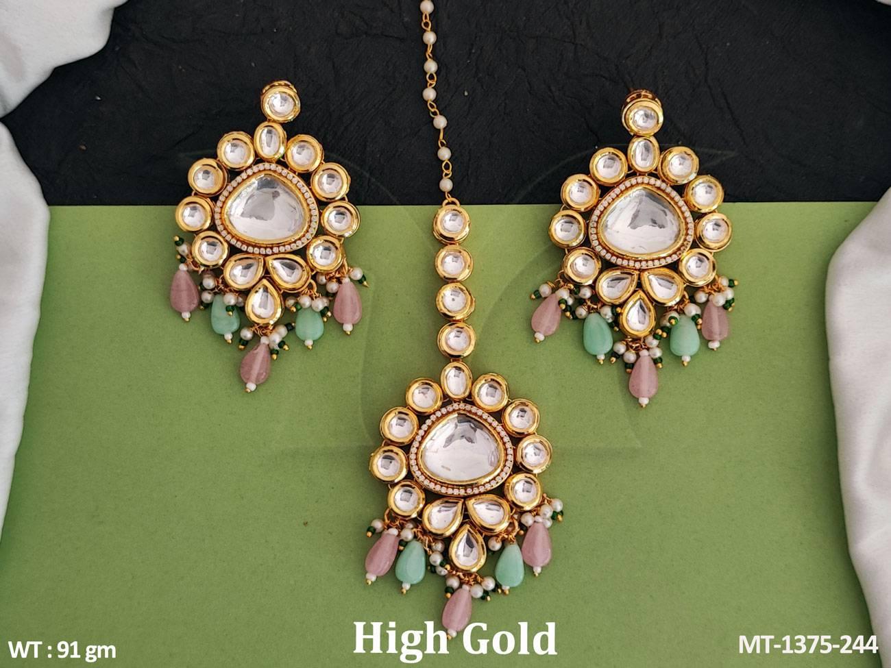 Add a touch of elegance to your ensemble with our Clustered Pearl High Gold Polish Maang Tikka and Earring set.