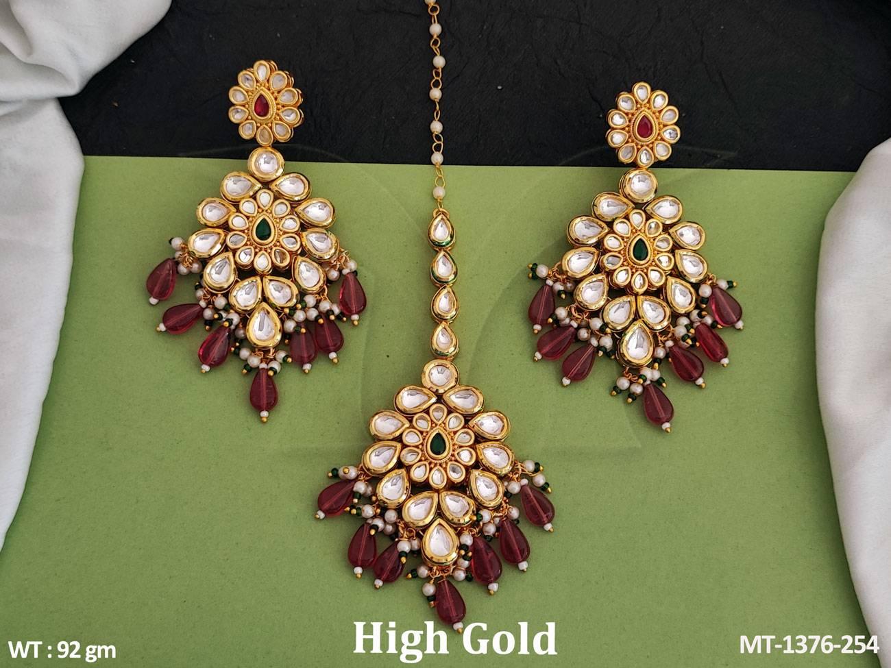 This beautiful kundan maang tikka and earring set is made of high-quality brass metal and features a high gold polish that adds a touch of elegance.