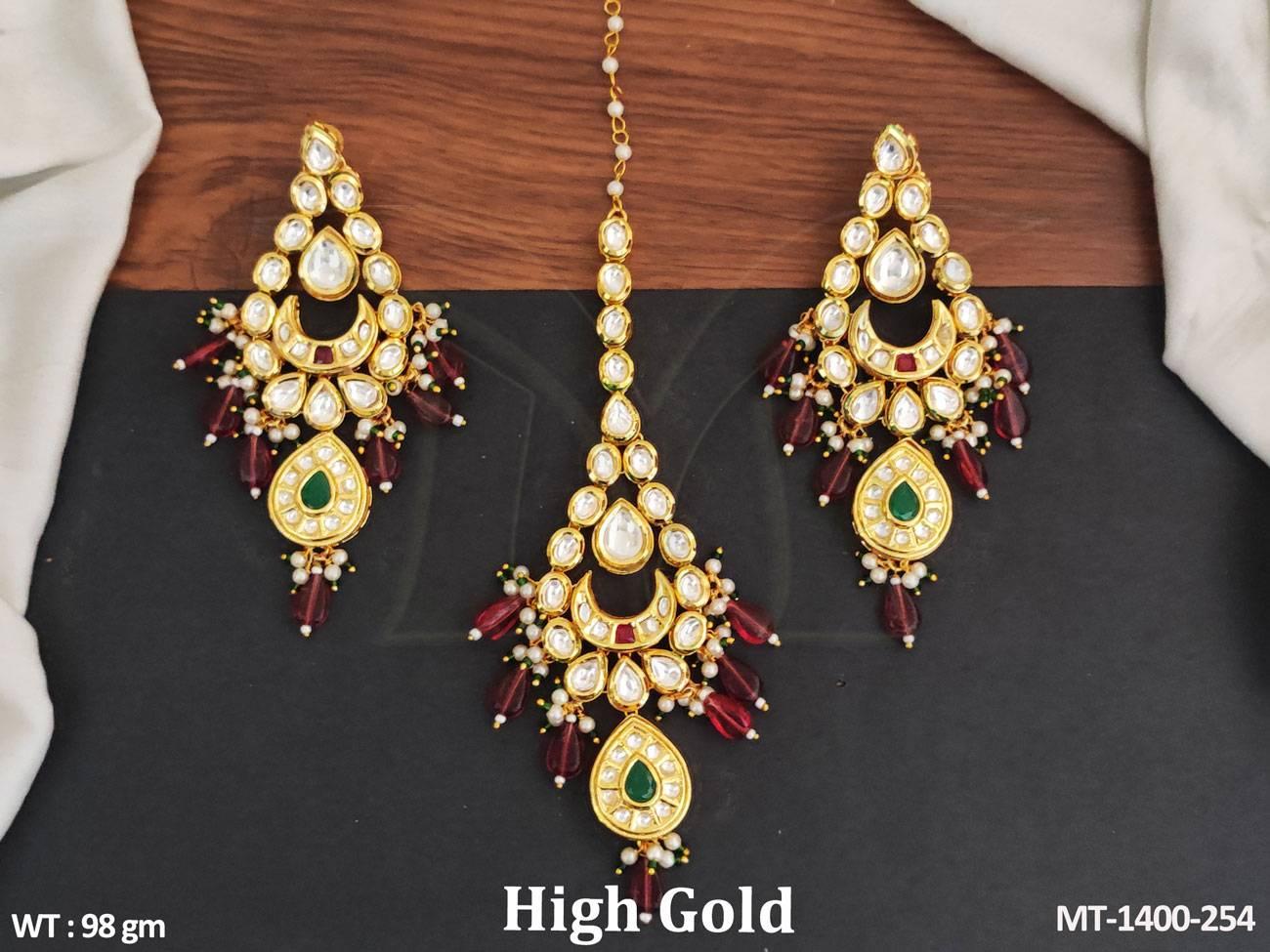 Impress with elegance in our High Gold Polish Kundan Stones Party wear Kundan Jewellery Kundan Maang Tikka and Earring set.