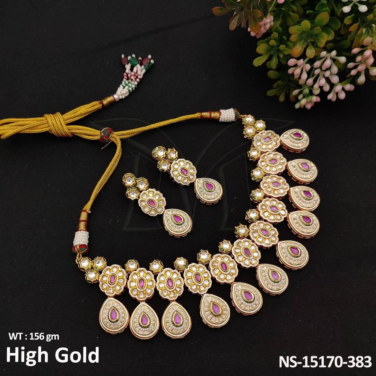 Infuse elegance into your look with our Designer Kundan Necklace Set.