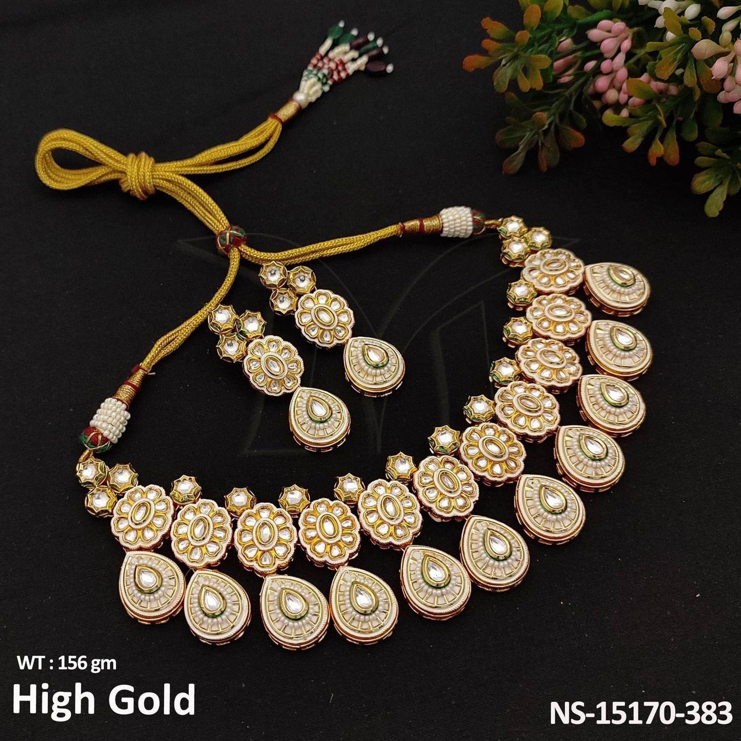 Infuse elegance into your look with our Designer Kundan Necklace Set.