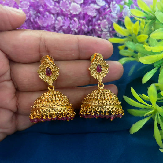 Expertly crafted and plated with gold, these Jhumki earrings are a must-have for any jewelry collection