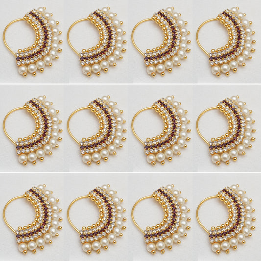 This Maroon Colour stone Gold Plated combo 12 pices Nath is a sophisticated and elegant choice for any occasion
