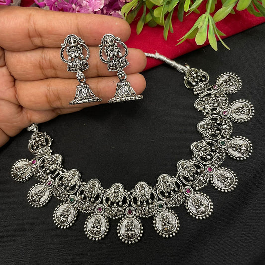 Enhance your traditional look with our Oxidised Temple Laxmi Chick Short Necklace Set