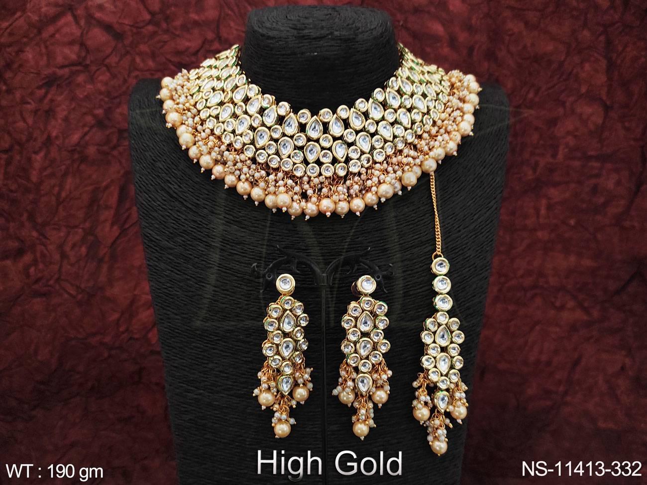 Crafted with high-quality Kundan stones and featuring a stunning high gold polish, this choker necklace set is the perfect addition to your party wear collection.