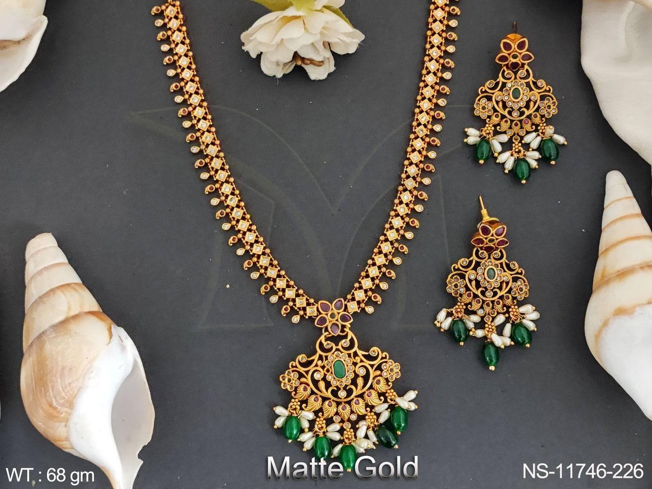 This Fancy Style Party wear Matte Gold Polish jewellery set features a beautiful kemp-studded long necklace that will add a touch of elegance to any look.