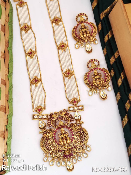 This Rajwadi long necklace set features a stunning God Laxmi pendant and intricate polish fancy designs