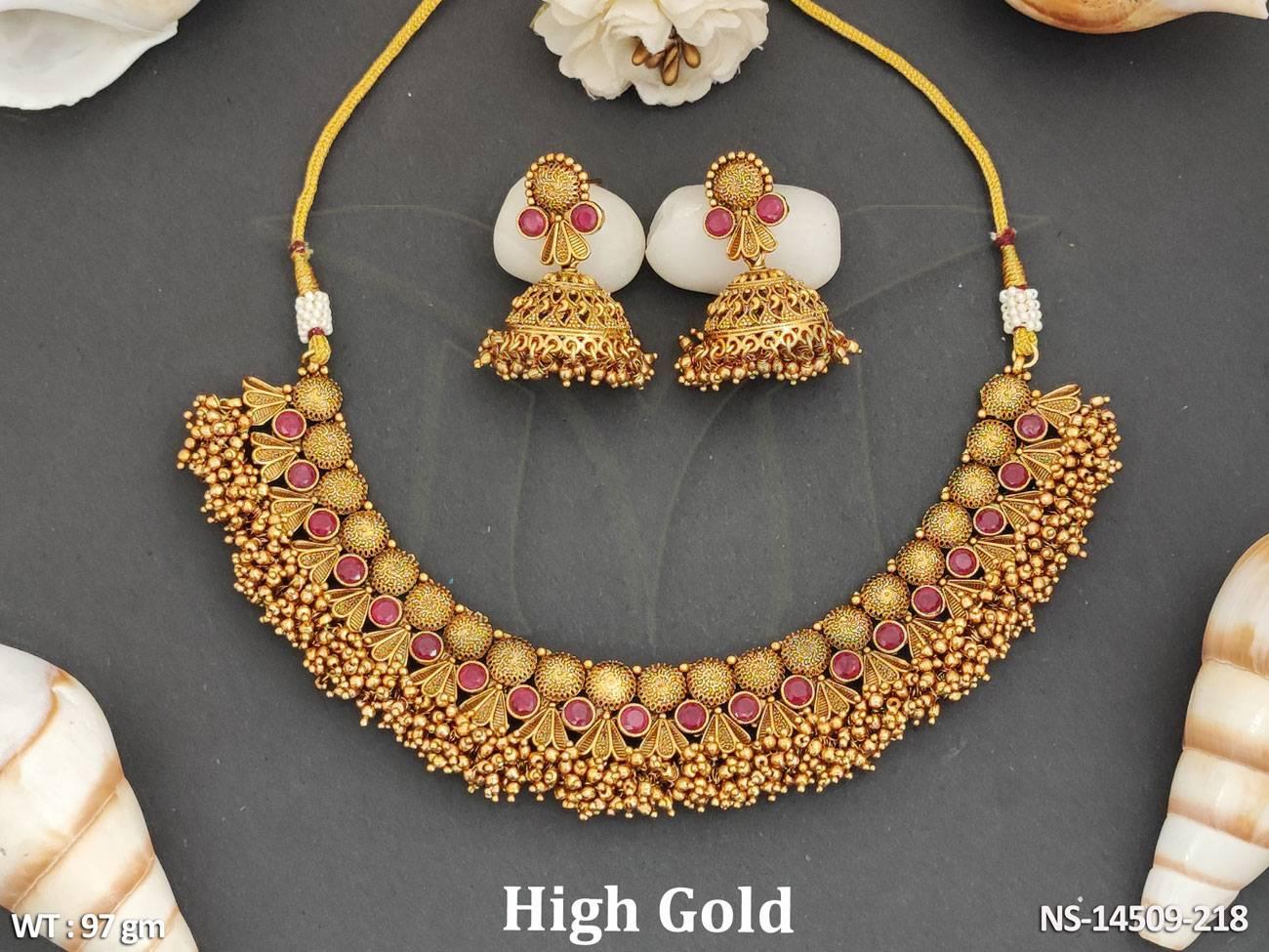 This Antique Jewellery High Gold Polish Clustered Pearl Fancy Style Necklace Set boasts a stunning design with high gold polish and clustered pearls.