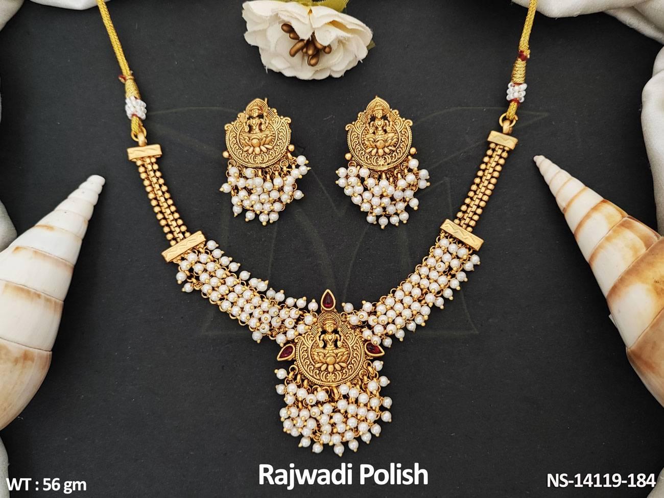 Rajwadi Polish Party Wear Fancy Temple Necklace Set features a traditional South Indian design with intricate detailing that will add a unique touch to any ensemble.