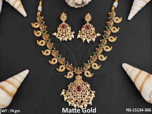 Expertly crafted with brass metal, this Temple Jewellery Cluster Pearl Necklace Set features a beautiful Matte Gold Polish and intricate God figure design.