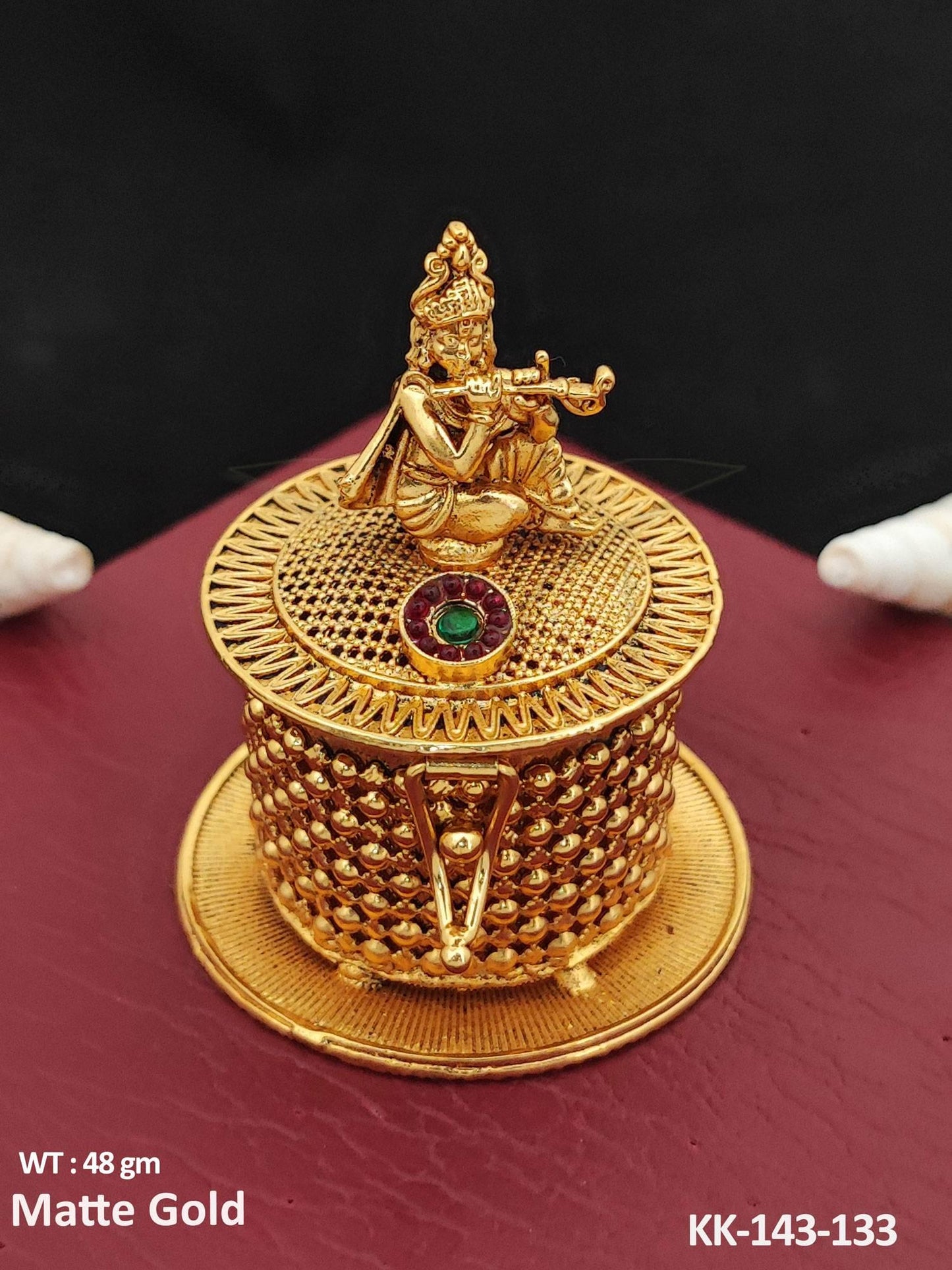 Bring a touch of divinity to your daily routine with our God Krishna Design Matte Gold Polish Temple Kumkum Sindoor Box