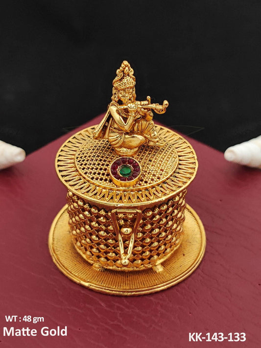 Bring a touch of divinity to your daily routine with our God Krishna Design Matte Gold Polish Temple Kumkum Sindoor Box