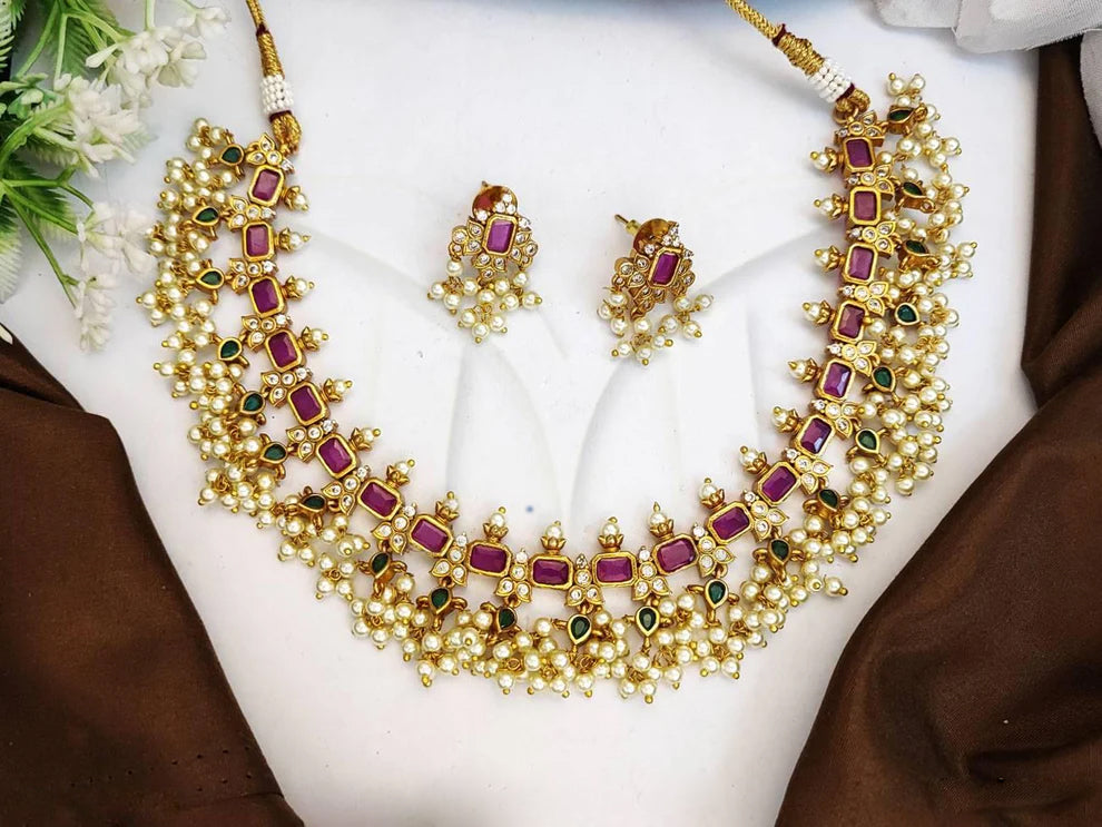 This stunning choker necklace set is crafted with quality Fancy Design and Party Wear Clustered Pearls.